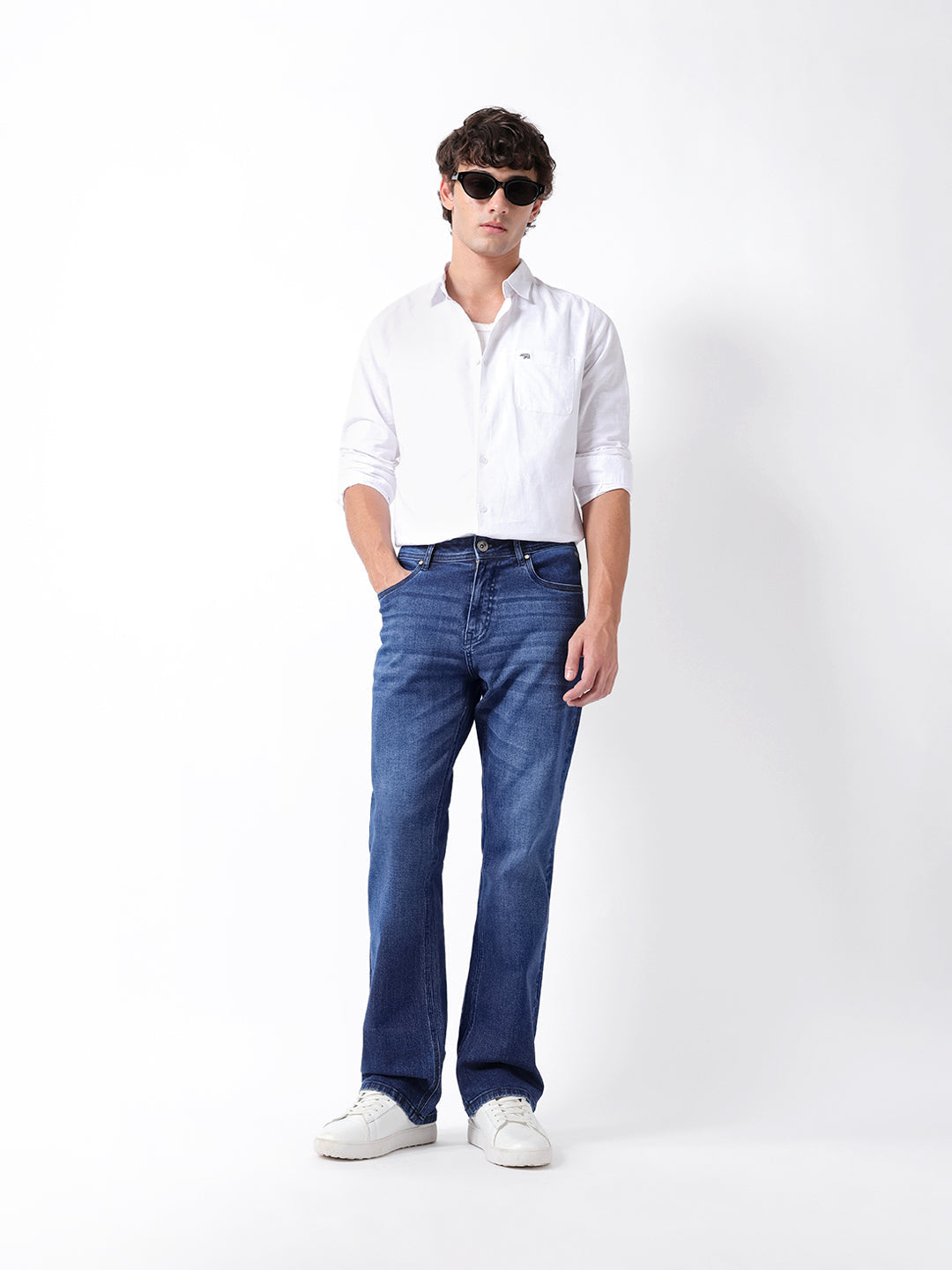 Mid Blue Mid-Rise Bootcut Jeans with Mid Fade