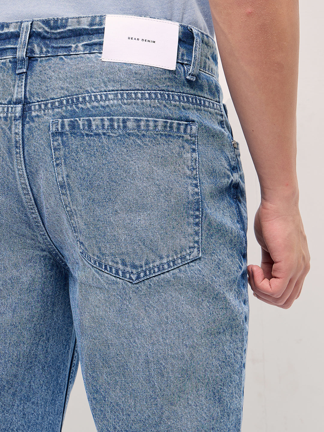 Mid Blue Straight Fit Mid Rise Jean with Light Washed Effect